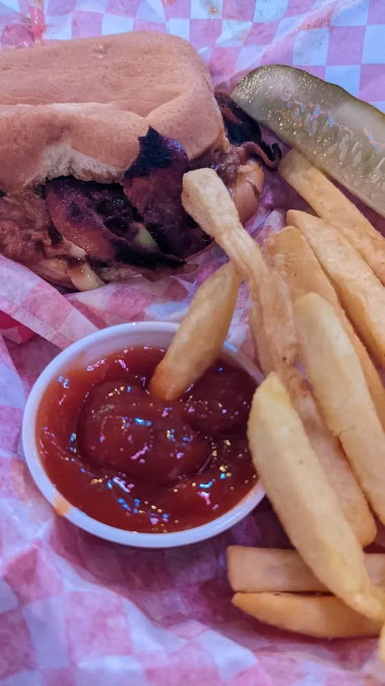 Slaw Hog Basket Fries and Pickle Spear
